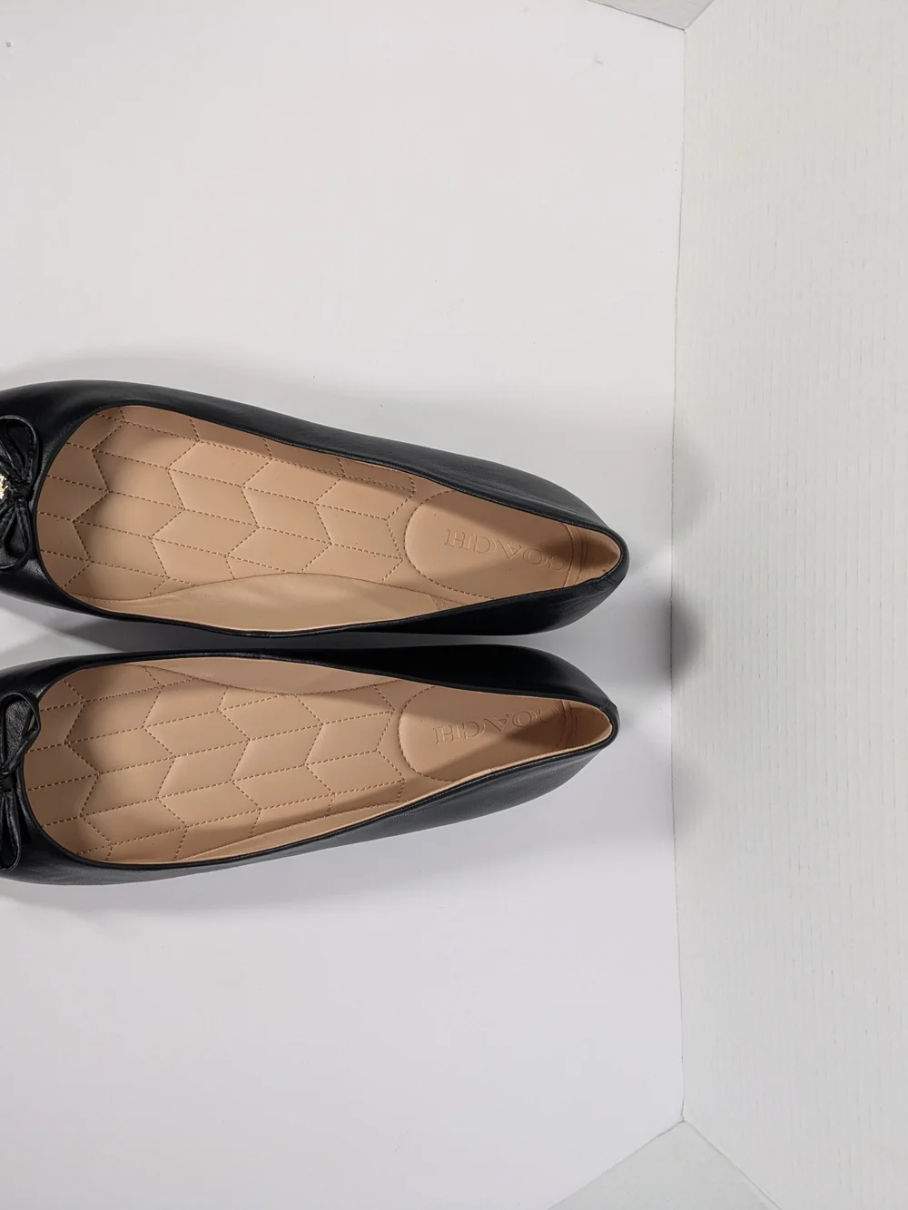 Coach Black Leather Pointed Ballet Flats with Bow and Gold Charm